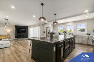 Open-concept kitchen and living area with modern design elements.